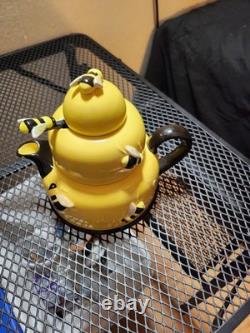 3 piece bumble bee sugar & tea tea pot, two tea cups and saucers, tw