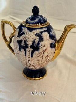6 late 19th century Bridgwood teacups with saucers and associated tea pot