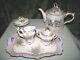 8 Pc Set Musical Teapot Plays Fluer De Lis Floral Design With Purple/gold