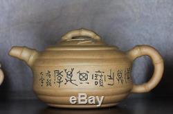A Set Of Chinese Republic Period Antique Yixing Zisha Teapot And Two Cups