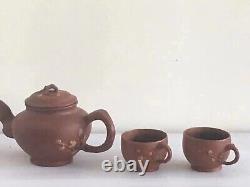 A set of fine purple clay teapot and Tea Bowl