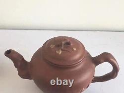 A set of fine purple clay teapot and Tea Bowl