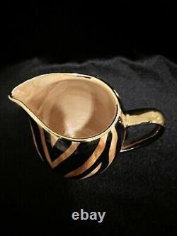 African? Mini tea cup, saucer set of 6, Included Tea Pot. Made from Africa