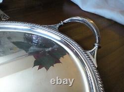 An ANTIQUE SILVER PLATED SELF POURING TEAPOT SET AND TRAY JAMES DIXON