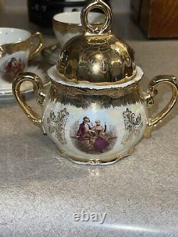 Antique Porcelain Gold 12 Piece Tea Set With Musical Tea Pot