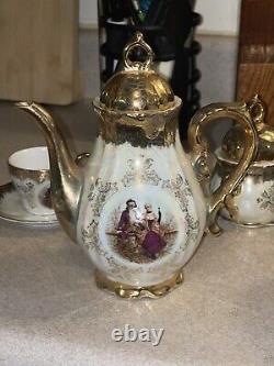Antique Porcelain Gold 12 Piece Tea Set With Musical Tea Pot