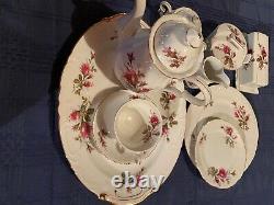 Antique tea set porcelain service for eight, tea pot, sugar, creamer, butter