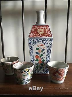 Beautiful Asian Porcelain Tea/Wine Pot and Cup Set