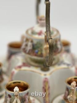 Capodimonte Porcelain Tea Set with Gold Accents and Hand-Painted Scenes