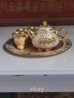 Chinese Antique Shell Porcelain Gold Plated Tea Pot, Cup, and Plate Set