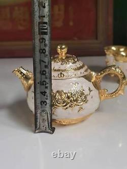 Chinese Antique Shell Porcelain Gold Plated Tea Pot, Cup, and Plate Set
