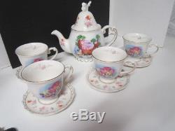 Disney Parks Alice In Wonderland Tea Set Teapot And 4 Cups And Saucers New