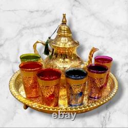 Elegant Moroccan tea set six cups, a teapot, and a handmade golden tray