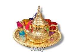 Elegant Moroccan tea set six cups, a teapot, and a handmade golden tray
