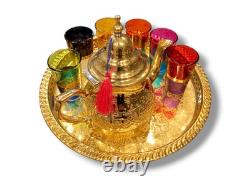 Elegant Moroccan tea set six cups, a teapot, and a handmade golden tray