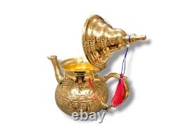 Elegant Moroccan tea set six cups, a teapot, and a handmade golden tray