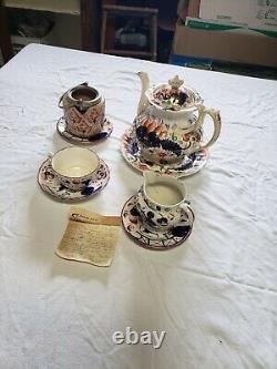 Gaudy Welsh tea set. Tea pot, 1 tea cup, 3 plates, a creamer and sugar dish