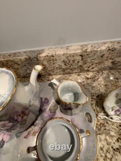 Hand Painted China Tea Set Service for 4. 13 pieces, cup & saucer holders