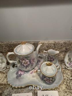 Hand Painted China Tea Set Service for 4. 13 pieces, cup & saucer holders