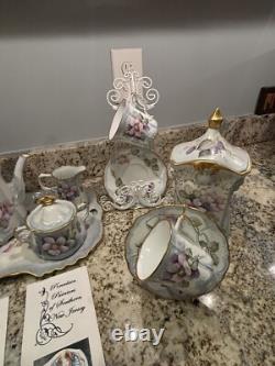 Hand Painted China Tea Set Service for 4. 13 pieces, cup & saucer holders