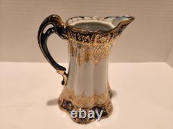 Hand painted Nippon Chocolate Pot, 4 cups and Saucers Navy Blue and Gold