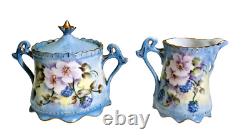 Limoges France hand painted, signed and dated Tea set-creamer, sugar, and teapot