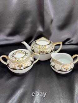 Noritake black and gold tea pot set. Very Rare Find. Unique Collection