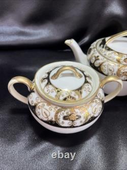 Noritake black and gold tea pot set. Very Rare Find. Unique Collection