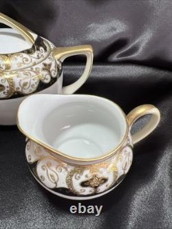 Noritake black and gold tea pot set. Very Rare Find. Unique Collection