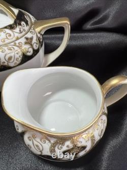 Noritake black and gold tea pot set. Very Rare Find. Unique Collection