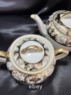Noritake black and gold tea pot set. Very Rare Find. Unique Collection
