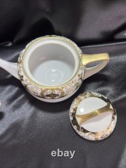 Noritake black and gold tea pot set. Very Rare Find. Unique Collection