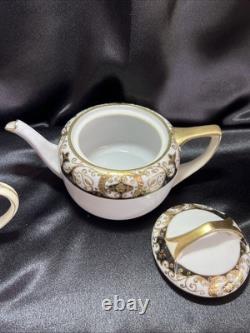 Noritake black and gold tea pot set. Very Rare Find. Unique Collection