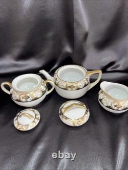 Noritake black and gold tea pot set. Very Rare Find. Unique Collection