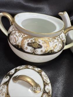 Noritake black and gold tea pot set. Very Rare Find. Unique Collection