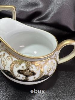 Noritake black and gold tea pot set. Very Rare Find. Unique Collection