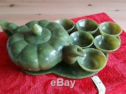 Oriental Jade Tea set with pot and 6 cups. In storage box