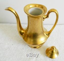 Pickard gold tea set with teapot, creamer, sugar, and underplate marked