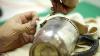 Polishing An Old Silver Teapot