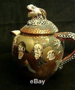 SATSUMA DRAGON. Teapot set pre 1920 thousand faces with deities scene