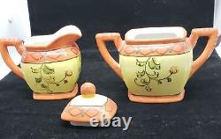 Stunning Tea Pot Set 5 demitasse cups, Covered Sugar Dish, Creamer and Tea Pot
