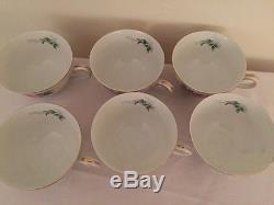 Tea Cups and saucers with matching creamer