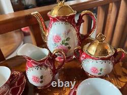Tea set porcelain from Germany hand-painted 22 karat gold trim