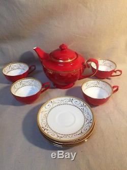 Teavana Red 9 pieces (4 tea cups, 4 saucers, Tea pot) Bone China Tea Set +Bonus