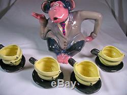 Traveling Monkey teapot with 4 Banana Cups and Saucers