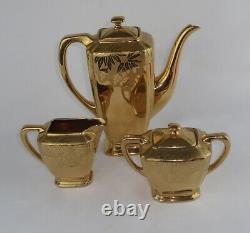 Vintage German Gold Encased Porcelain Tea Set Teapot Sugar Creamer Poinsettia