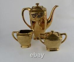 Vintage German Gold Encased Porcelain Tea Set Teapot Sugar Creamer Poinsettia