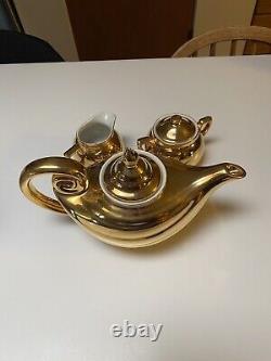 Vintage Golden glow Paul Aladdin tea pot set 22 karat gold