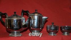 Vintage Russian tea set 2 teapots, creamer and sugar bowl