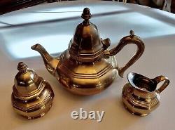 Vintage unbranded solid brass teapot set with creamer and sugar very heavy